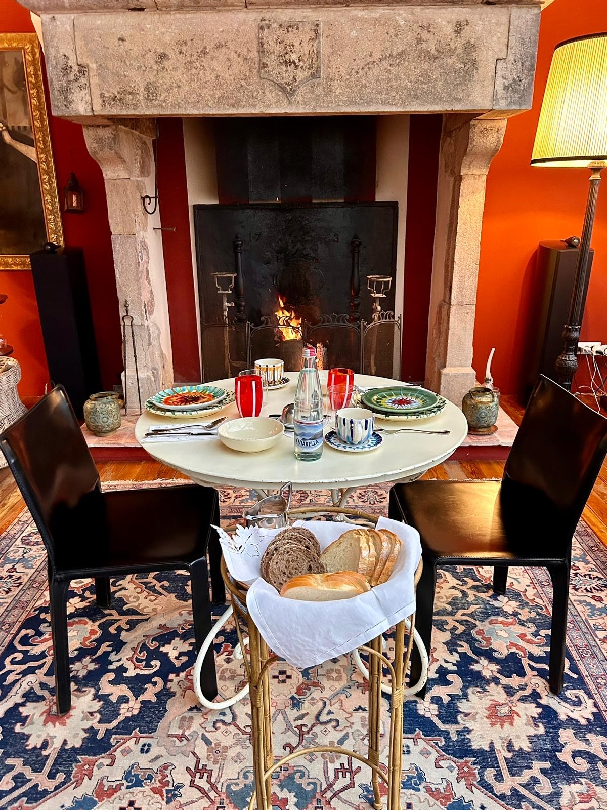 Breakfast by the stone fireplace